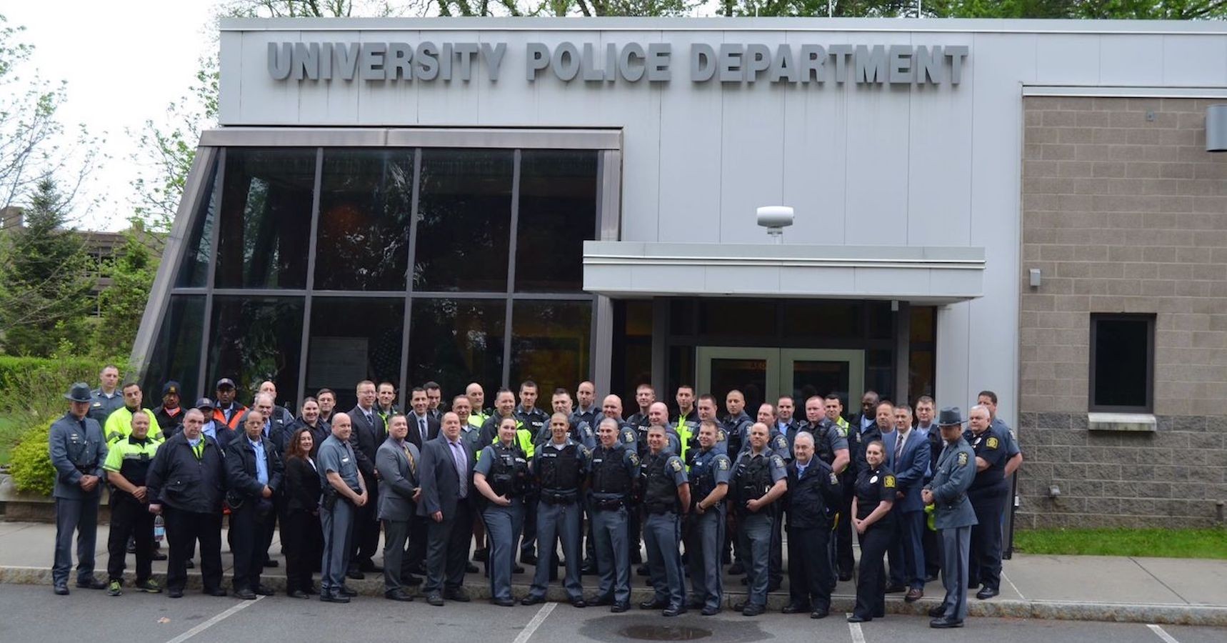 UPD in front of police department building 