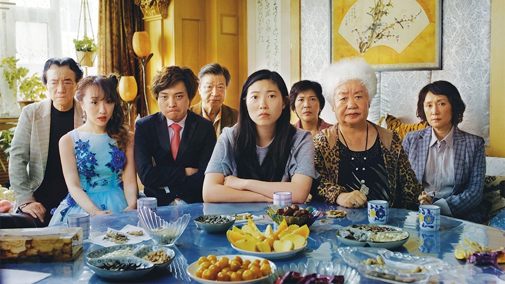 WGSS and Journalism alumna Nora Lum (BA, 2011), aka Awkwafina, center in Lulu Wang’s film&nbsp;The Farewell&nbsp;(2019)