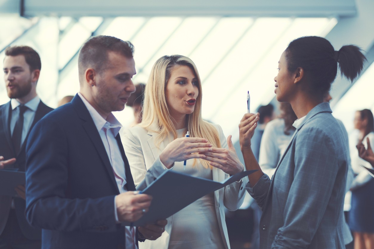 Group of young professionals having a discussion
