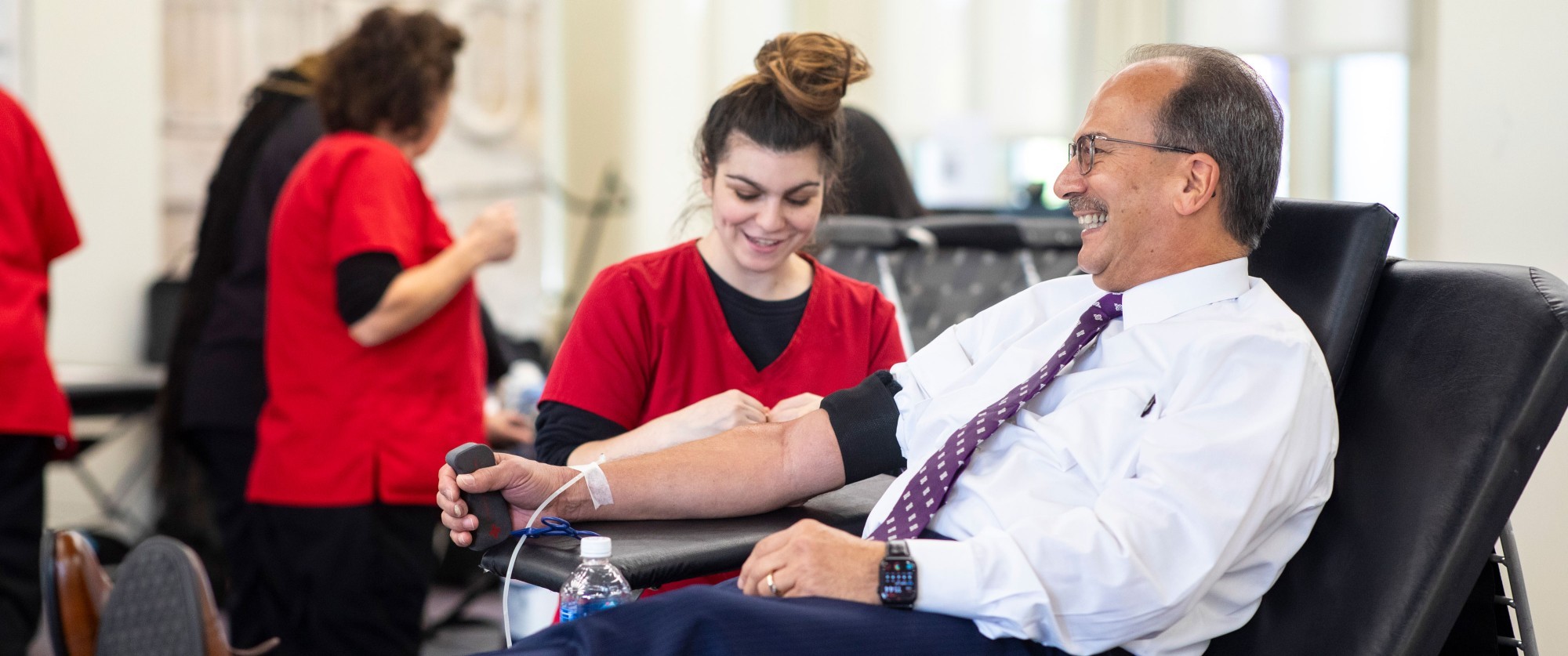 UAlbany President Havidán Rodríguez donates blood during an American Red Cross blood drive at UAlbany.