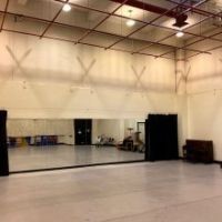 PAC's Dance Studio has high ceilings and a mirror on the side wall
