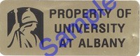 A sample of a New York State asset tag. This tag is brownish gold, with the UAlbany logo and the words "Property of University at Albany."
