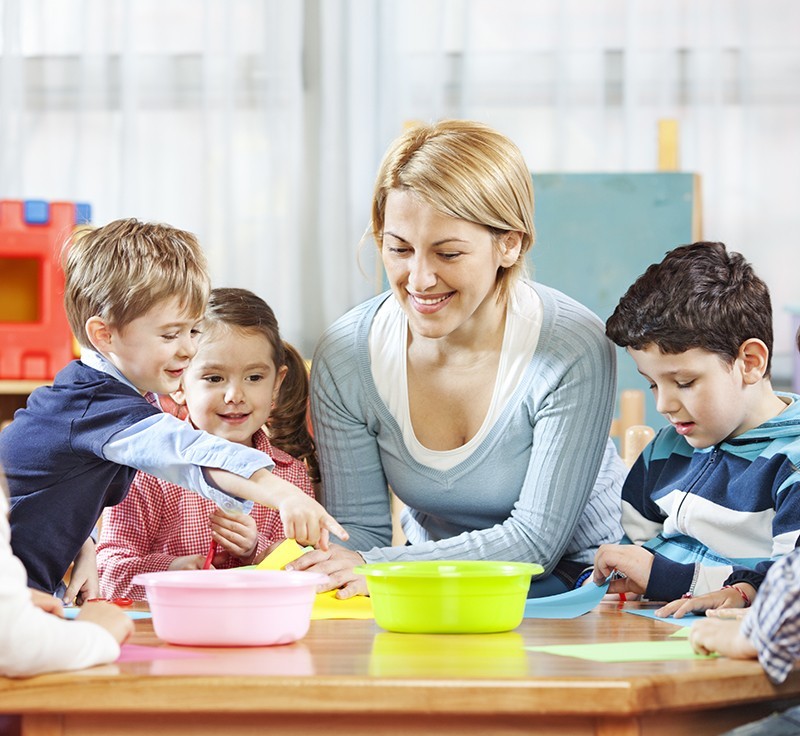 Teacher working with a group of students