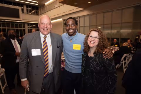 L to R: Lewis Weiner, Semi Awopetu (scholarship winner), Jill Delaney pose at the 2022 Celebration of Scholarships dinner
