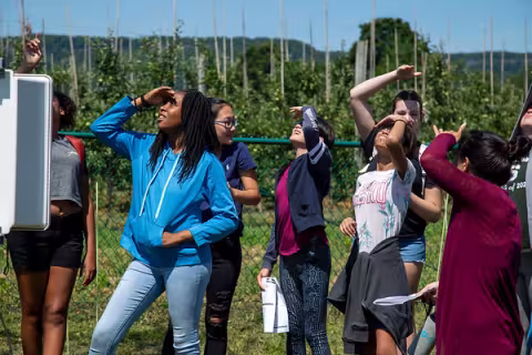 Girls Inc. Eureka! program camp at UAlbany 2019 - looking at the weather