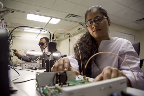 Electrical and Computer Engineering students working in Prof. Hany Elgala's lab