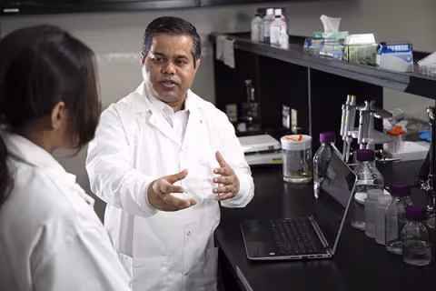 Environmental and Sustainable Engineering Prof Aynul Bari teaching student in lab