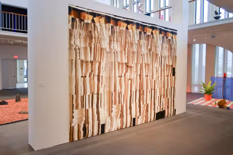 a wall with a pixelated shower curtain