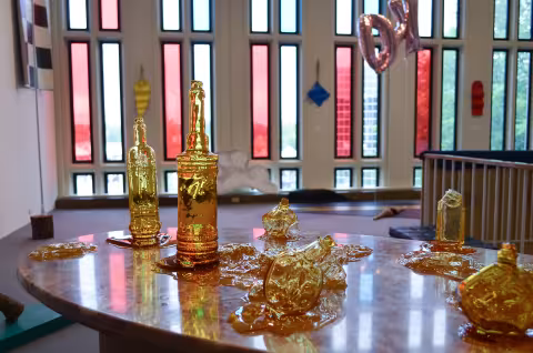 a table with melting bottles on it