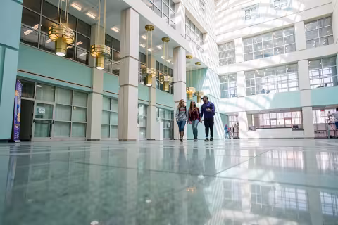 Students walk through the Science Library on UAlbany's Main Campus.