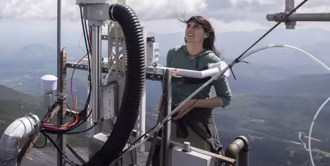 Dr. Sara Lance working on weather research equipment at University at Albany's Atmospheric Sciences Research Center Whiteface Mountain Summit Weather Station on Tuesday, August 24, 2021. (photo by Patrick Dodson)