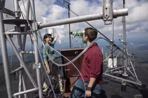 ASRC research associate Sara Lance and PhD student Christopher Lawrence conduct cloud water research at the University at Albany's Atmospheric Sciences Research Center Whiteface Mountain Summit Weather Station on Tuesday, August 24, 2021. (photo by Patrick Dodson)