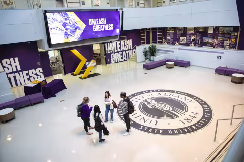 Students standing in University Hall