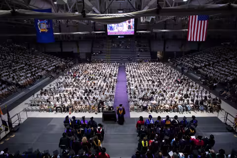 Crowd shot of the University President addressing the class of 2023 at Convocation.