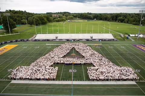 Class of 2023 Class Photo in the SEFCU Arena