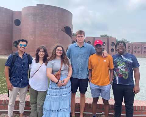 Md. Aynul Bari's NSF research team in front of a government building in Dhaka, Bengladesh.