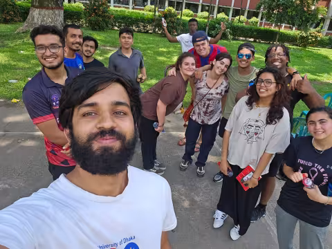 Members of Md. Aynul Bari's NSF summer research team meet with cricket players in Dhaka.