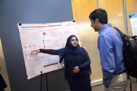 Students present at the SUNY AI Symposium on Oct. 16 at ETEC. (Photo by Patrick Dodson)