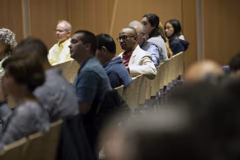 Audience members listen during the BioInnovation Forum at UAlbany's ETEC.