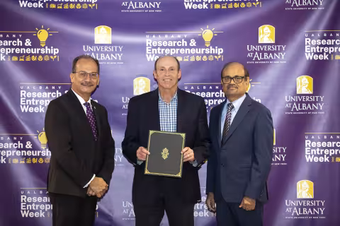 Jeffrey Freedman, ASRC, with UAlbany President Havidán Rodríguez and Vice President for Research and Economic Development Thenkurussi “Kesh” Kesavadas.
