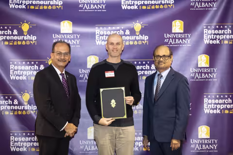 Ken Halvorsen, The RNA Institute, with UAlbany President Havidán Rodríguez and Vice President for Research and Economic Development Thenkurussi “Kesh” Kesavadas.