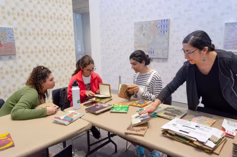 Participants working on their covers