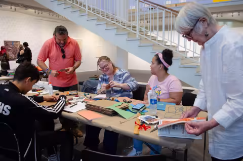 Participants working on their covers