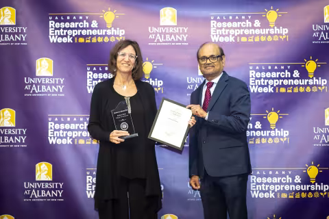 Professor Barbara Sutton with Vice President for Research and Economic Development Thenkurussi (Kesh) Kesavadas.