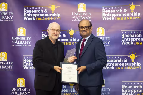 Professor Max Lifchitz with Vice President for Research and Economic Development Thenkurussi (Kesh) Kesavadas.