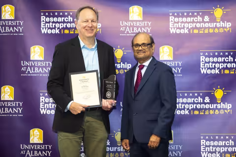Professor Peter Shea with Vice President for Research and Economic Development Thenkurussi (Kesh) Kesavadas.