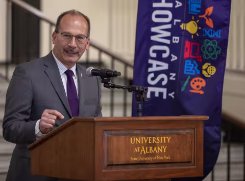 President addressing an audience from a lectern 