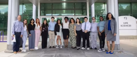 2023 REU in RNA Cohort group photo in front of the UAlbany Life Sciences Building.