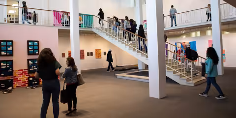 Visitors walking through the University Art Museum