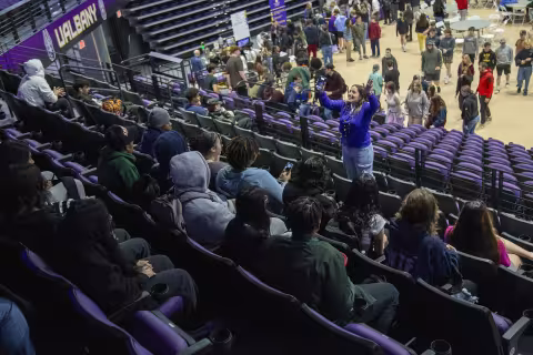 A teacher speaks to her students at Broadview Center on the UAlbany Campus during Showcase Day 2024.
