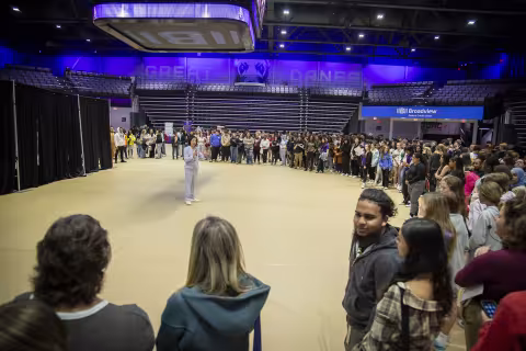 UAlbany Provost Carol Kim talks to students and visitors at Showcase Day 2024 at Broadview Center.