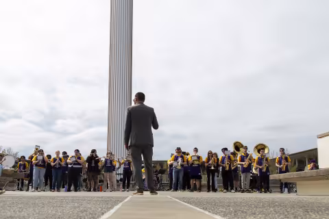 The UAlbany Marching Band plays during Showcase Day on the Academic Podium at UAlbany.