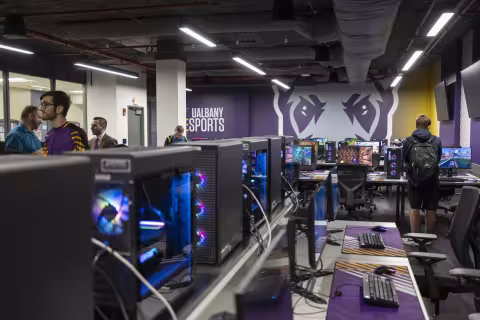 A row of gaming PCs in the new esports arena at UAlbany.