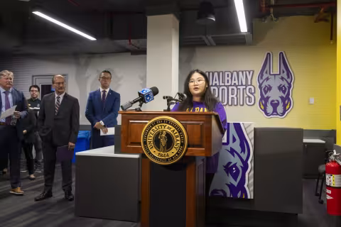 UAlbany sophomore Nicole Zhong shares remarks inside the new esports arena at UAlbany.