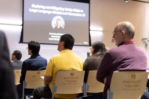 Attendees listen to the keynote address during R&E Week in October, 2024 at UAlbany.