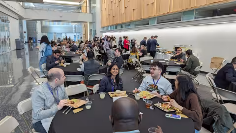 Conference participants enjoy networking over lunch.