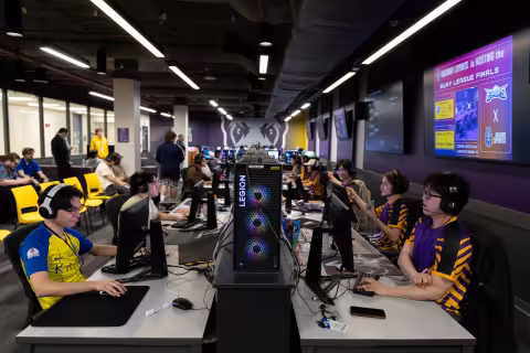 Rows of students compete in the SUNY Esports Tournament.