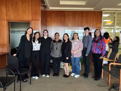 Students and faculty pose for a group photo at UAlbany Showcase 2025.