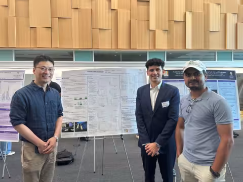 Group at a poster session at ETEC.