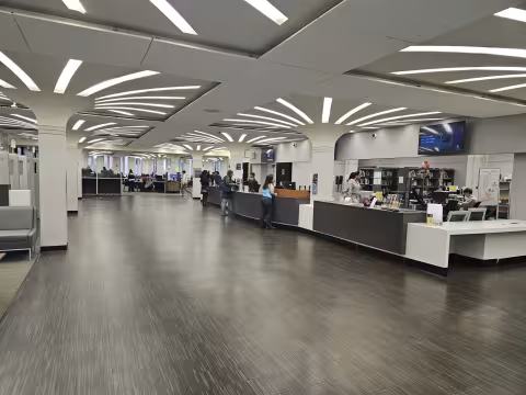 A public facing help desk inside the University Library.