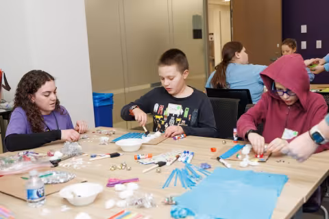 Children and volunteers participate in games and activities.