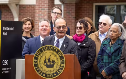 County Executive Dan McCoy joined UAlbany President Havidan Rodriguez for a press conference where he announced their intention to purchase Centennial Hall, a former residence hall, for $12 million. Photo by Brian Busher