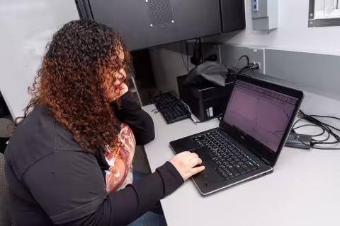 UAlbany student Emely Martinez-Pichardo reviews data following a weather balloon launch.