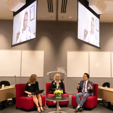 Three speakers sitting at the 2nd Annual Summit for the Global Center in AI Mental Health at the Suny Global Center in NYC.
