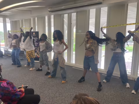 Six students dancing.