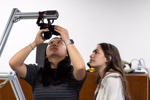 Students experiment with equipment inside UAlbany's Mobile Sensor Lab.